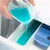 Close up of hand pouring laundry detergent in a washing machine. Closeup image.; Shutterstock ID 149986265