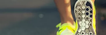 Runner woman feet running on road closeup on shoe. Female fitness model sunrise jog workout. Sports healthy lifestyle concept.; Shutterstock ID 259045955