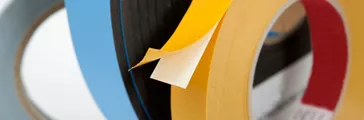 Assorted rolls of double-sided adhesive tape. Used for Labelexpo 2013.
