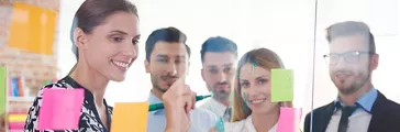 Office workers and colorful papers