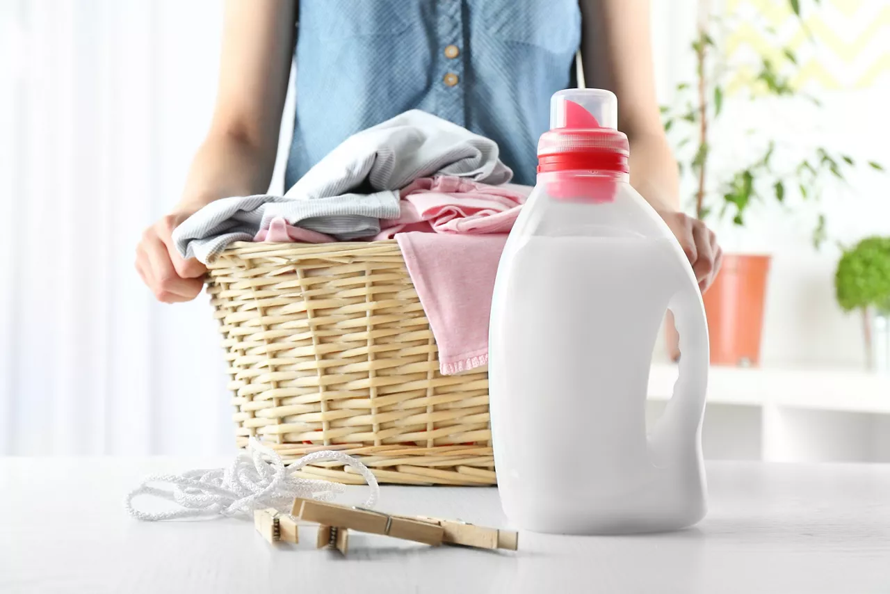 Laundry basket with detergent and pegs