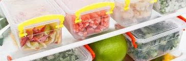 Frozen food in the refrigerator. Vegetables on the freezer shelves. Stocks of meal for the winter.