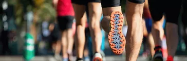 Runners' legs, shot of the legs of runners in a marathon.