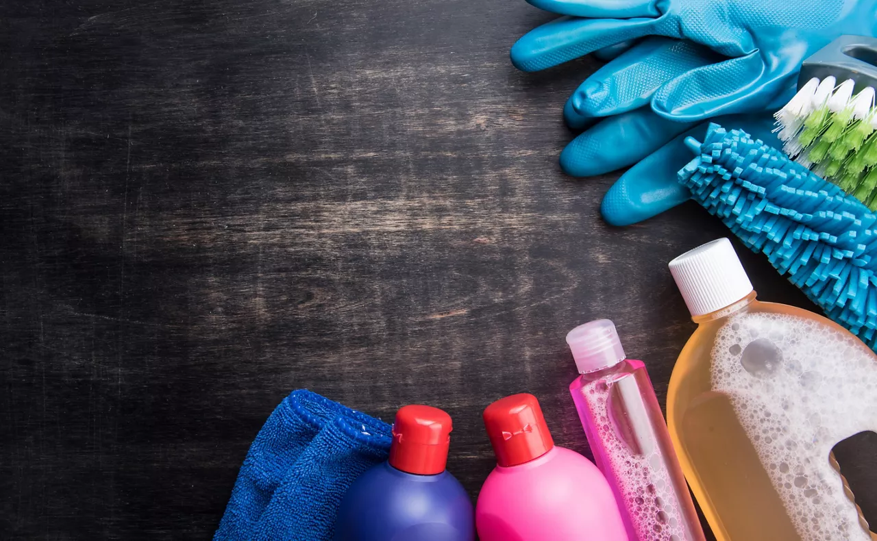 Cleaning products and tools on a wooden floor,Cleaning concept