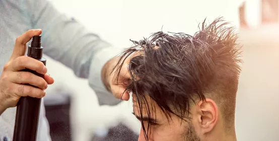 Man Hair Styling with Hair-spray