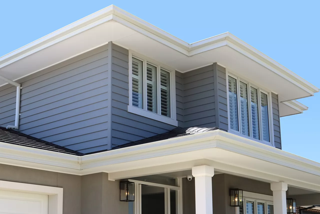 House showing roof, foam trim and windows. 