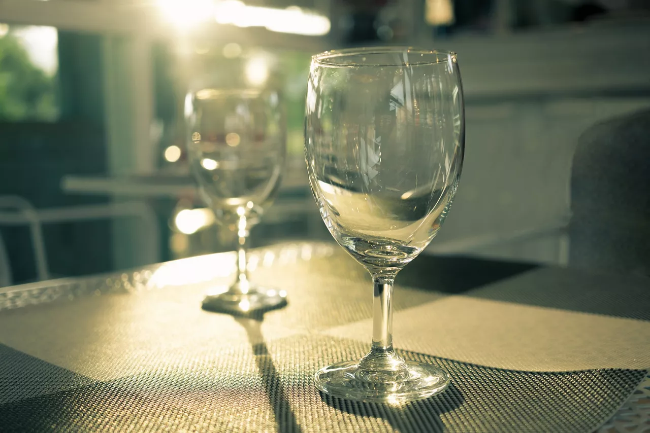 Shiny wine glass on countertop