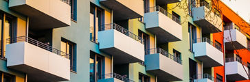 colorful apartment building with block formed balcony