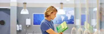 Man choosing frozen food box 