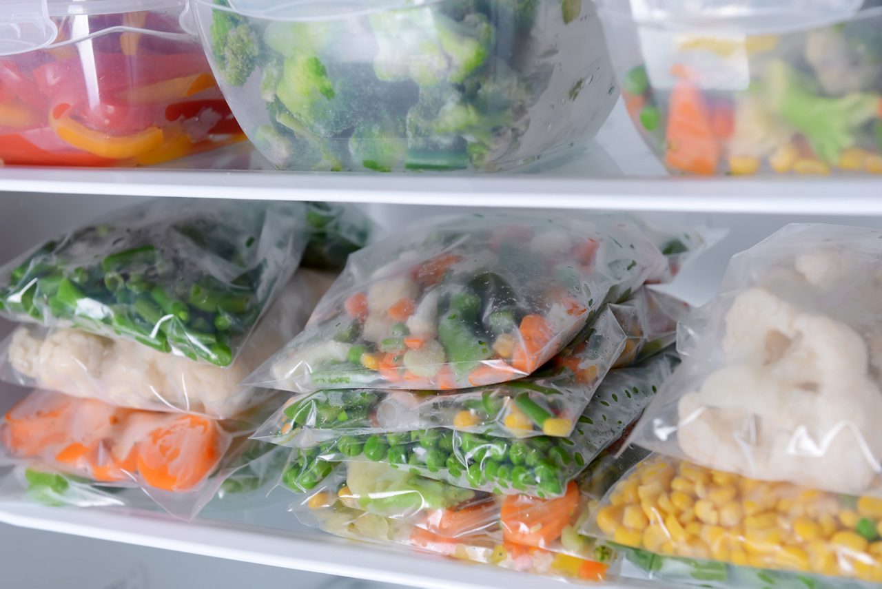 Frozen vegetables in freezer with RETAIN logo