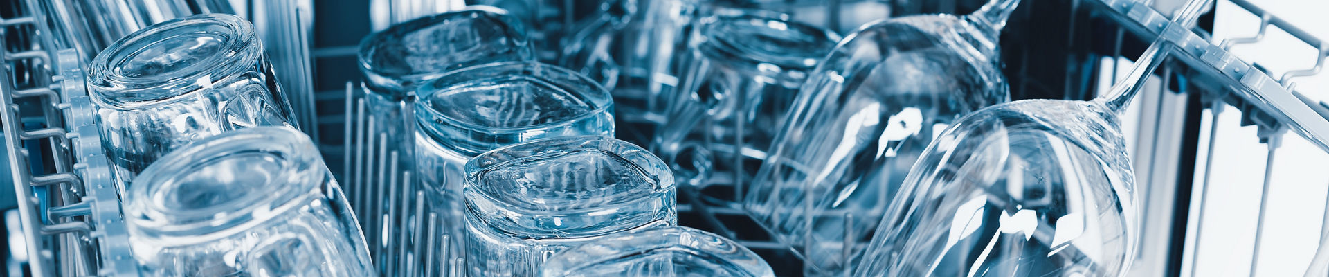 Freshly washed glasses in a dishwasher