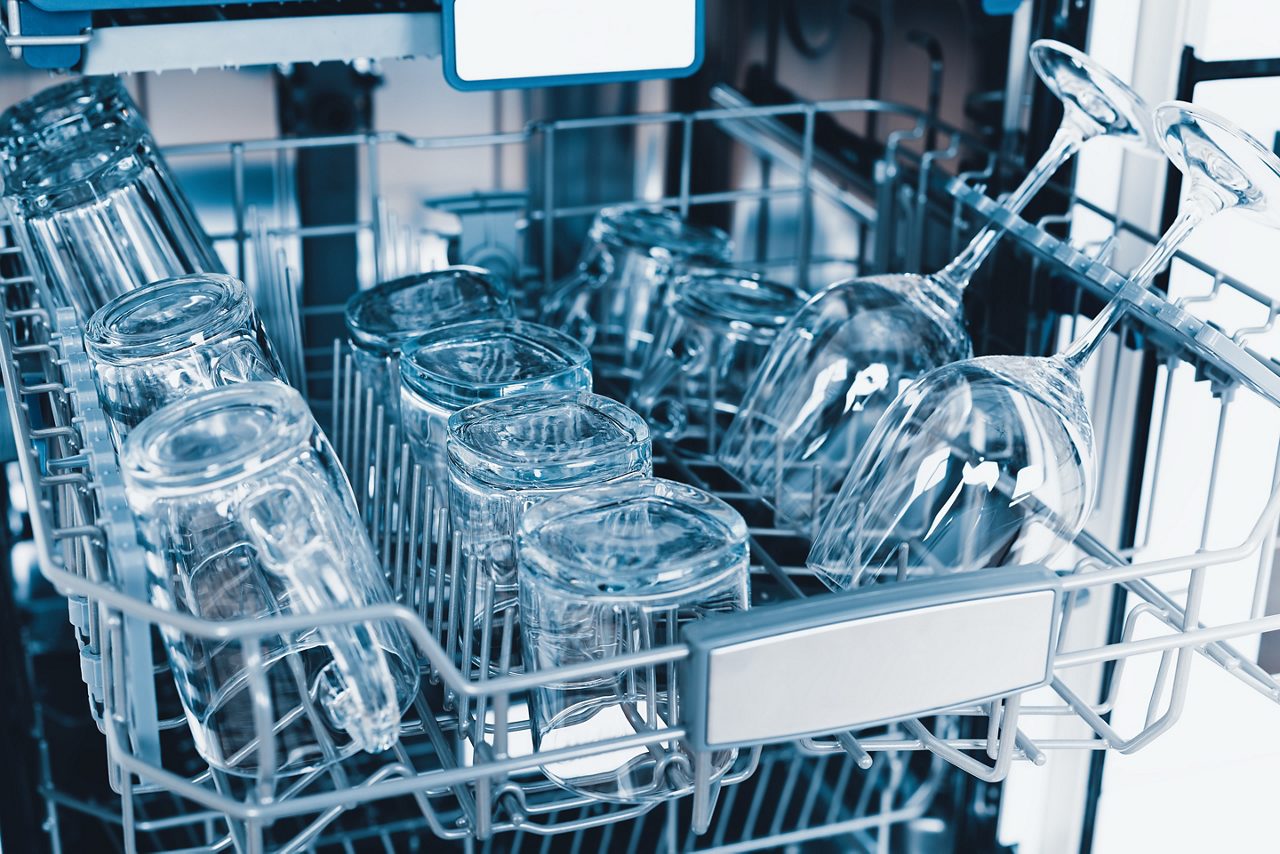 Freshly washed glasses in a dishwasher