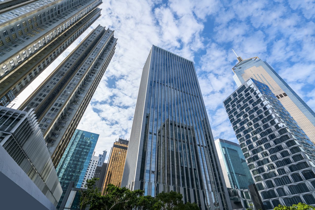 Skyscrapers in Hong Kong viewed from a low angle.     