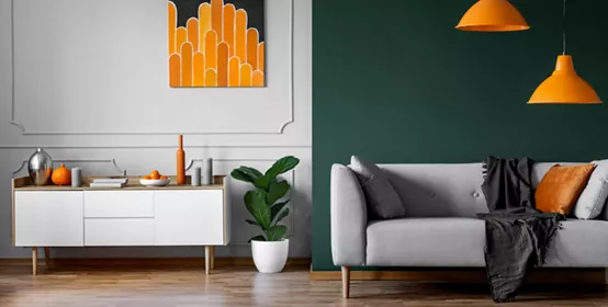 Green wall with orange lamps