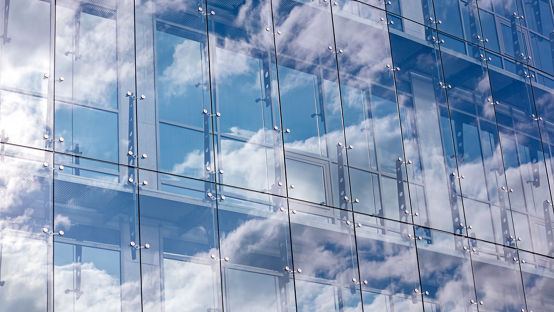 transparent glass wall of modern office building