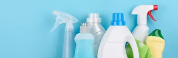 Cleaning products on pastel background