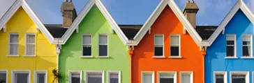 Row of brightly painted multicoloured houses