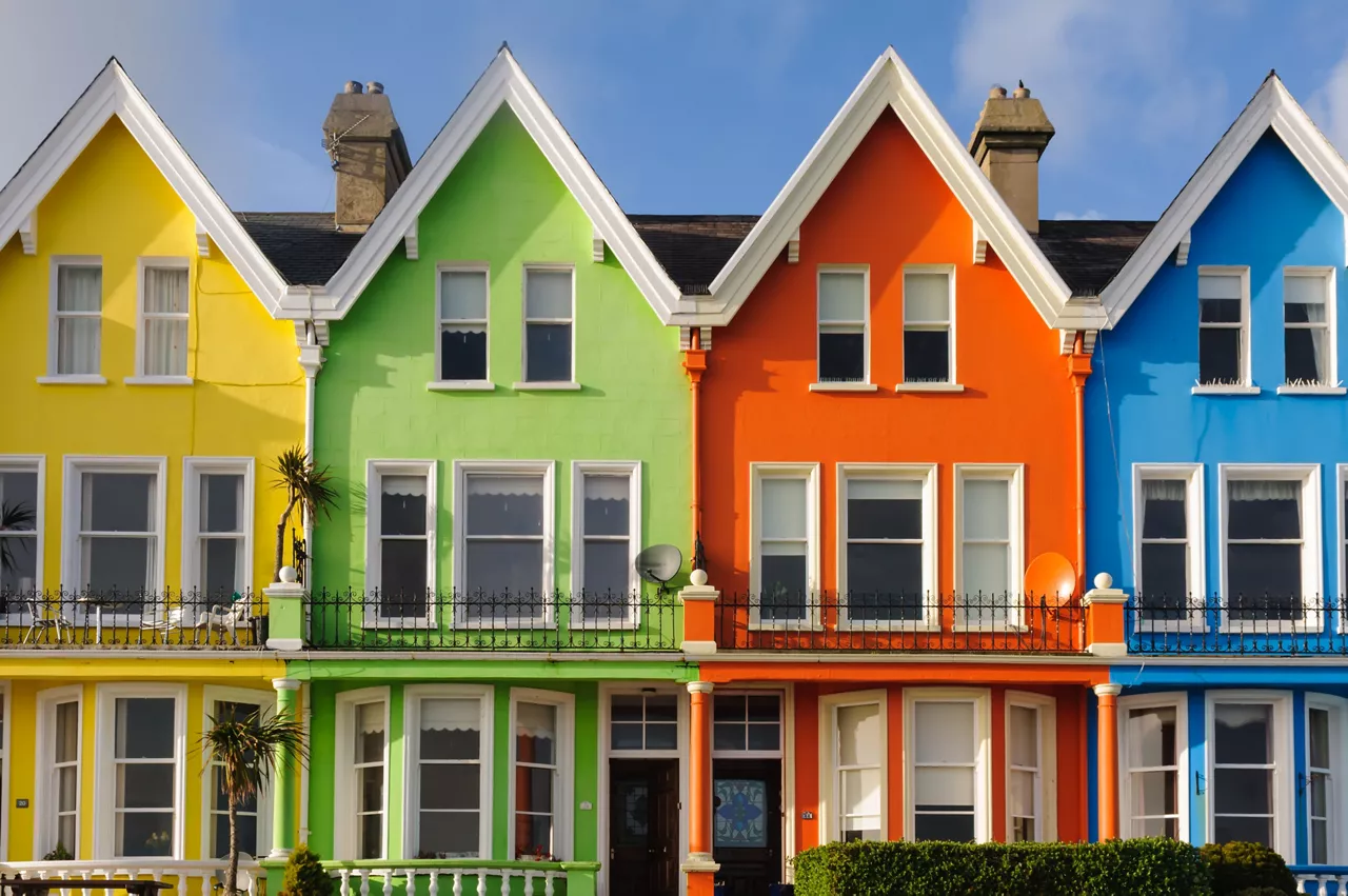 Row of brightly painted multi-colored houses in Whitehead, Northern Ireland 