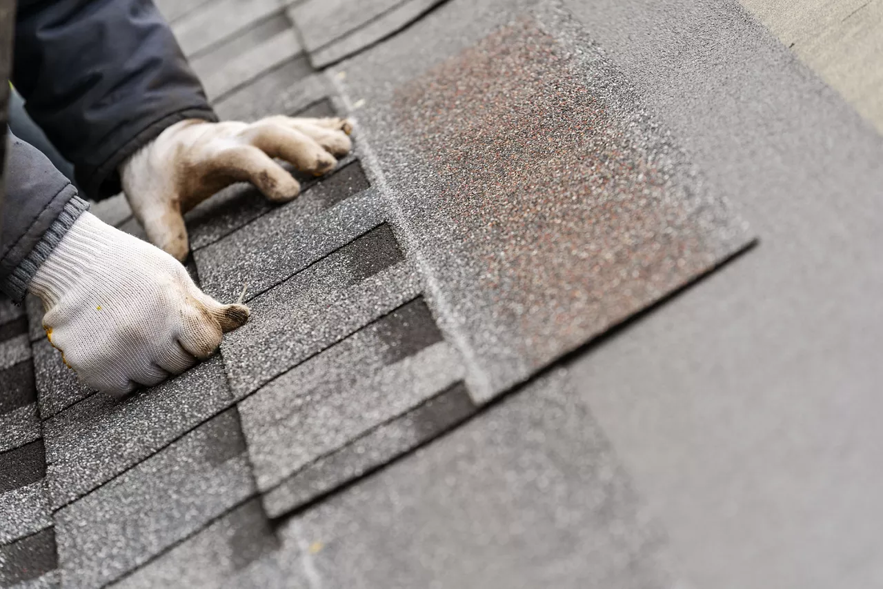 skilled workman on roof