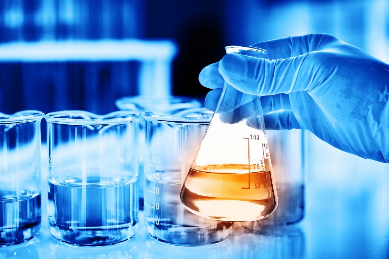 Scientist holding an Erlenmeyer flask