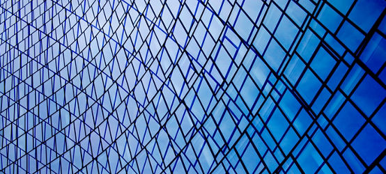 Digitally rendered image of structural glazing. Modern architecture fragment with glass wall, ceiling or roof made of transparent panels. Abstract geometric background with checkered or grid pattern.