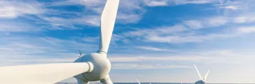 Wind turbines in a green field