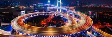 Cars driving at night on the Nanpu Bridge in Shanghai 