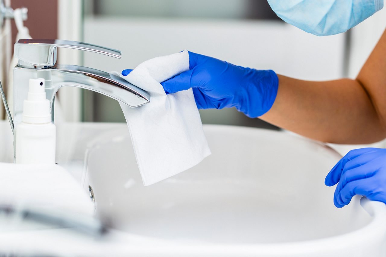 Coronavirus prevention, hygiene to stop spreading coronavirus. Decontamination and tap surface.