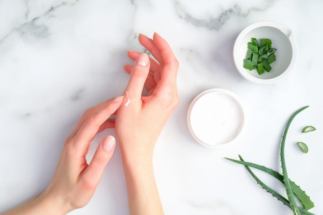 Cosmetic cream on female hands
