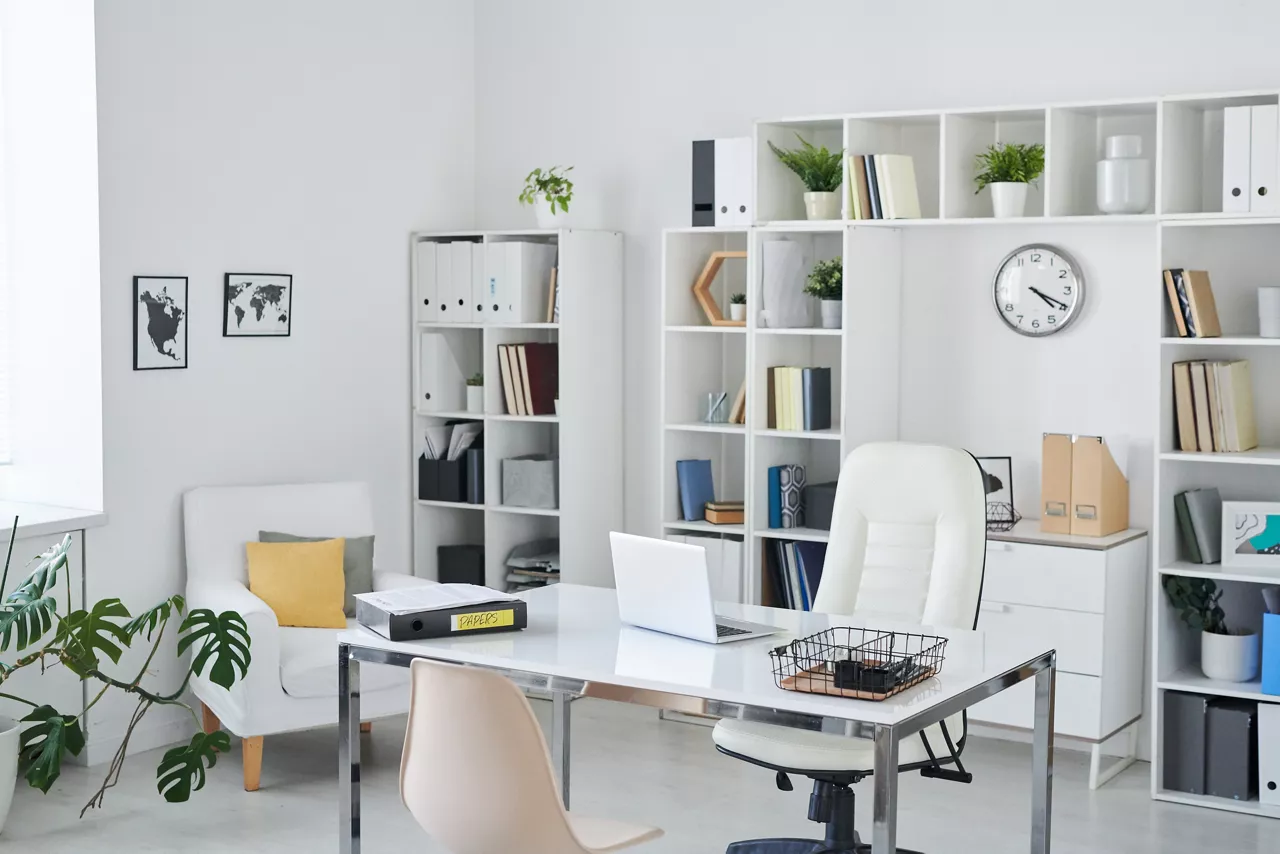 Office of business person with desk.