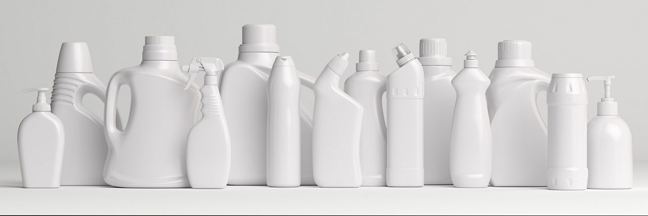 White Bottles of Household Cleaning Solutions