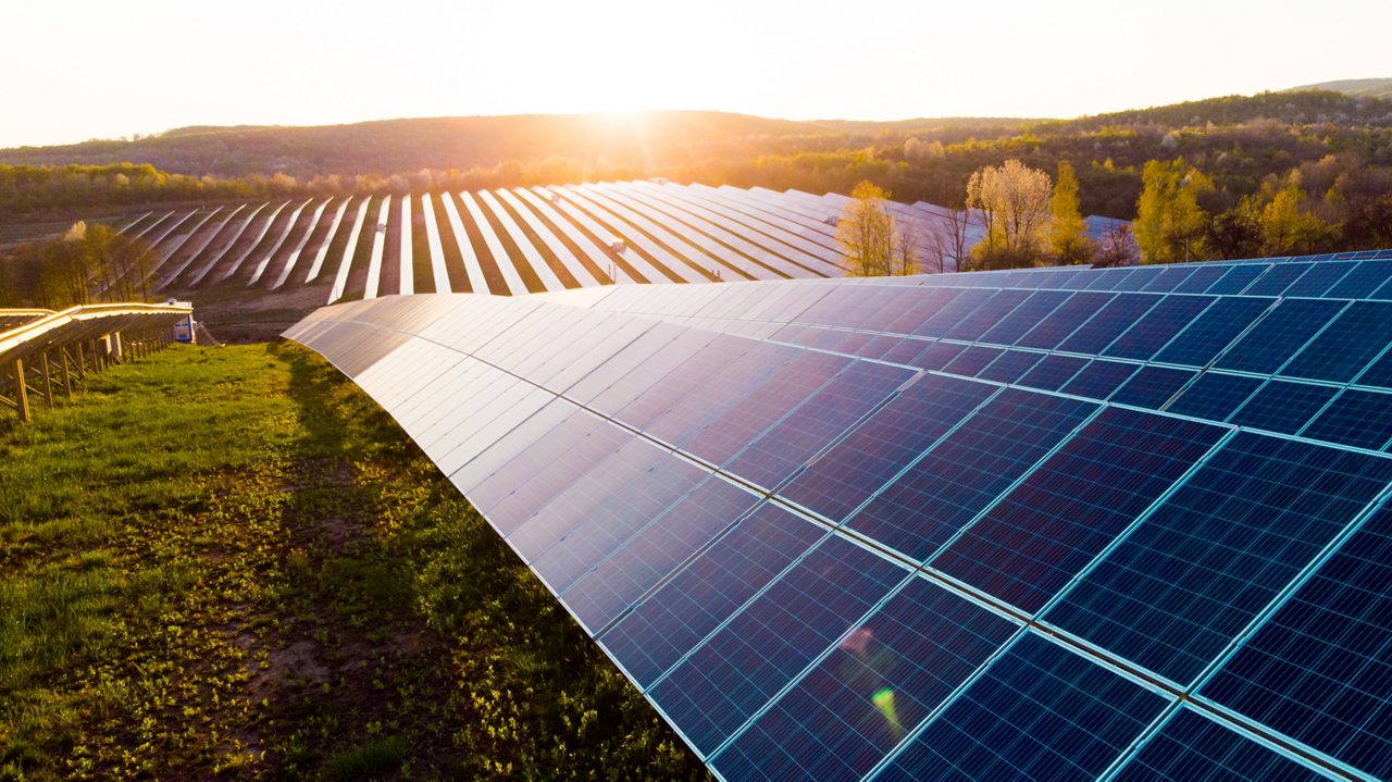 Solar panels (solar cell) in solar farm with sunlight to create clean electric power