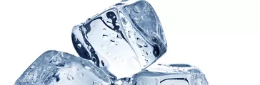 Three ice cubes on white background
