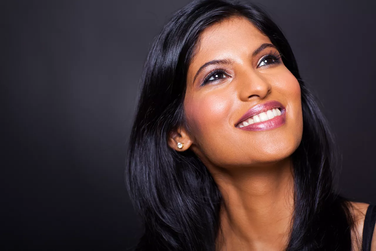 beautiful indian woman looking up