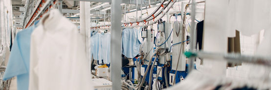 Dry cleaning clothes. Clean cloth chemical process. Laundry industrial dry-cleaning.
