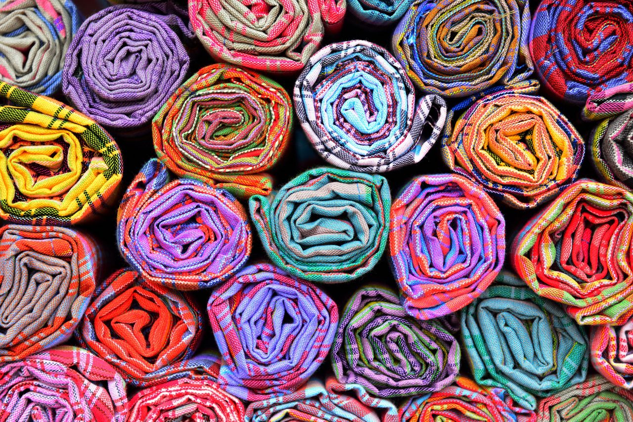 Brightly colored fabrics enabled by silicone solutions for sustainable textile production