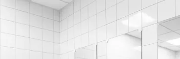 White metro tiles and black grout in a bathroom