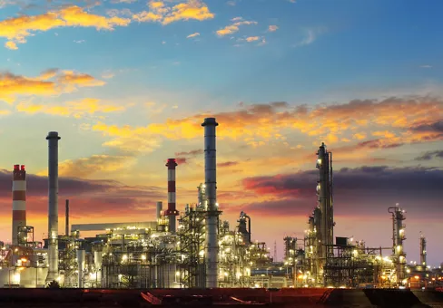 Oil refinery industrial plant at night