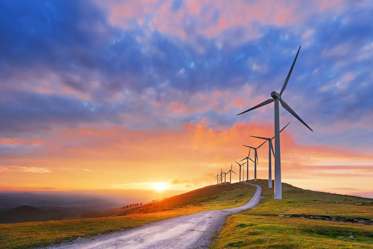 Wind turbines in Oiz eolic park at sunset