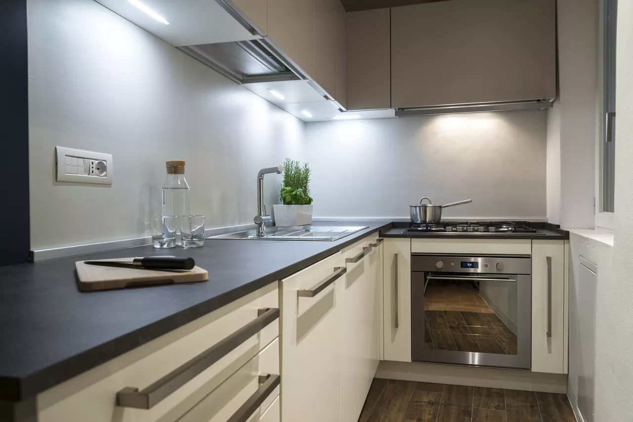 Modern minimalist kitchen in the evening.