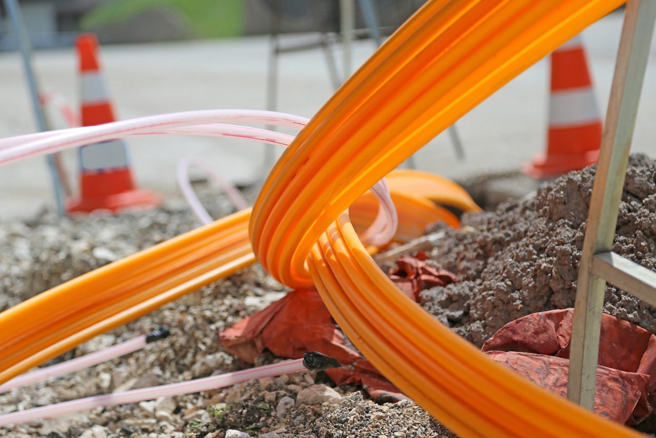 Telecommunications cables being installed underground 