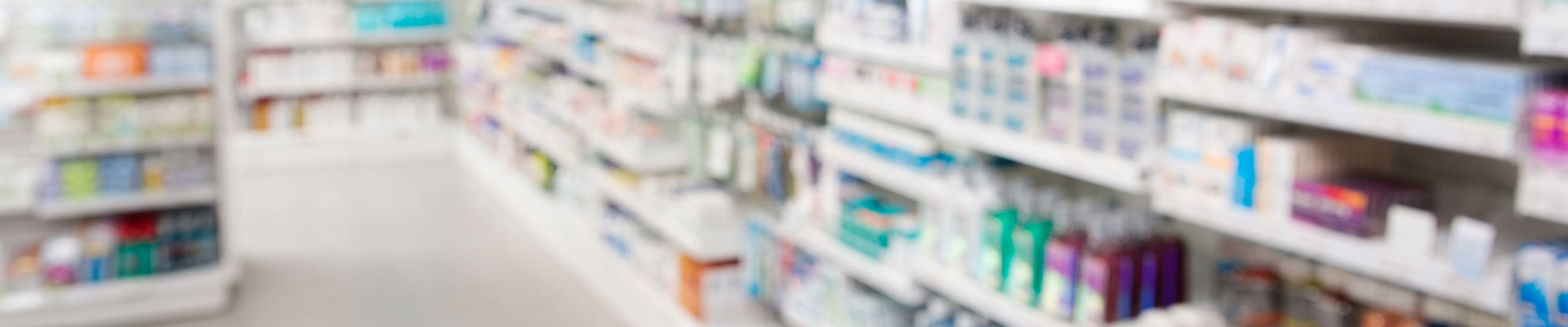 Medicines arranged in shelves at pharmacy