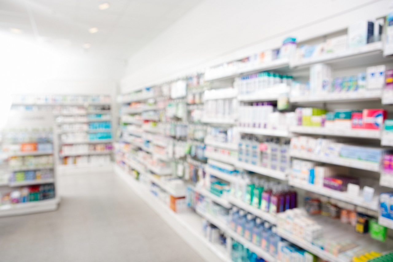 Medicines arranged in shelves at pharmacy