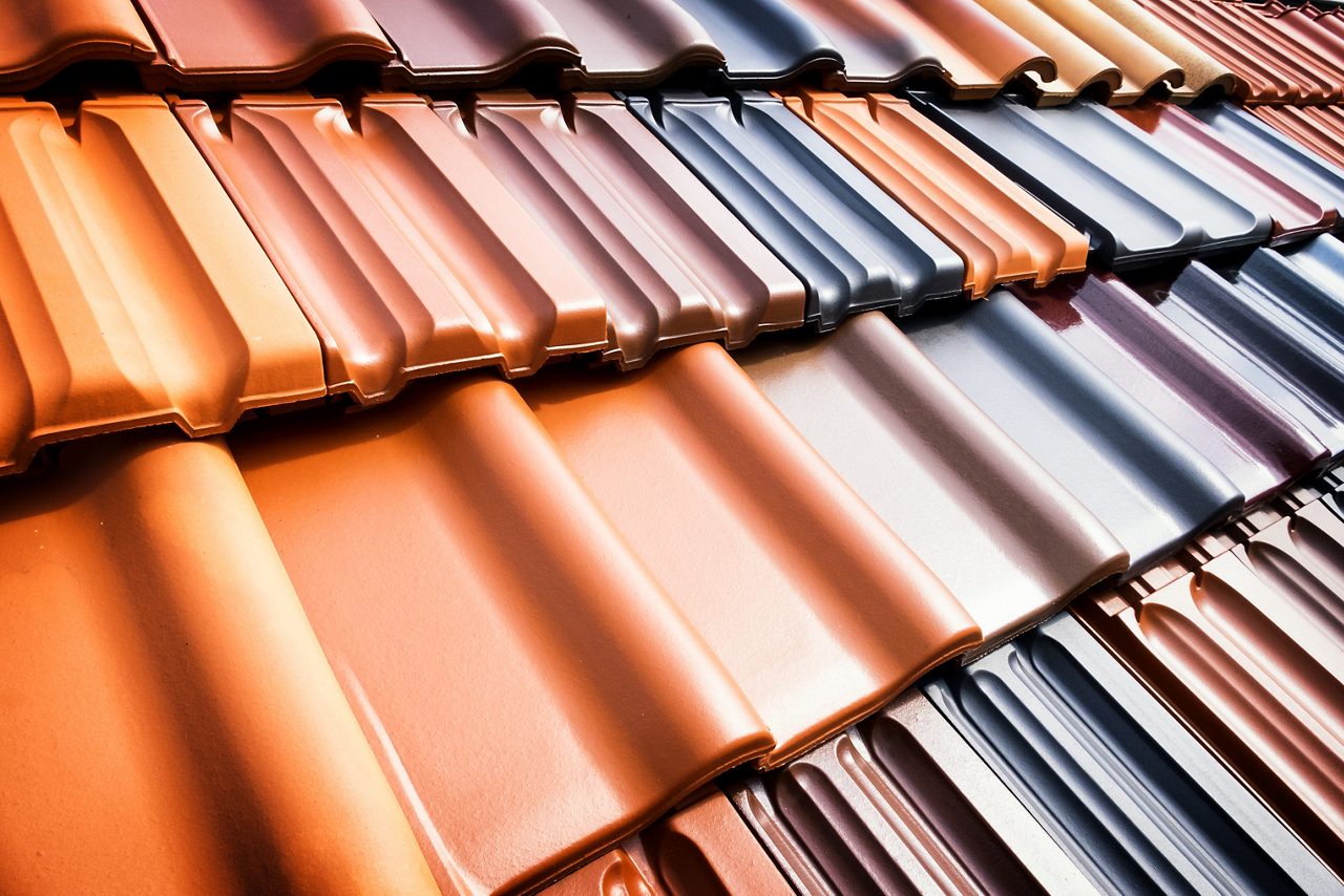 Roof tiles in varying shades of orange and blue