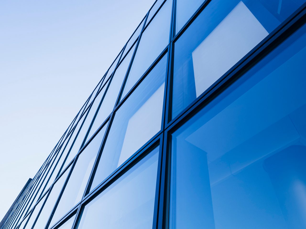 Architecture detail Modern Glass facade Blue tone 