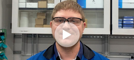 Man with play button overlay