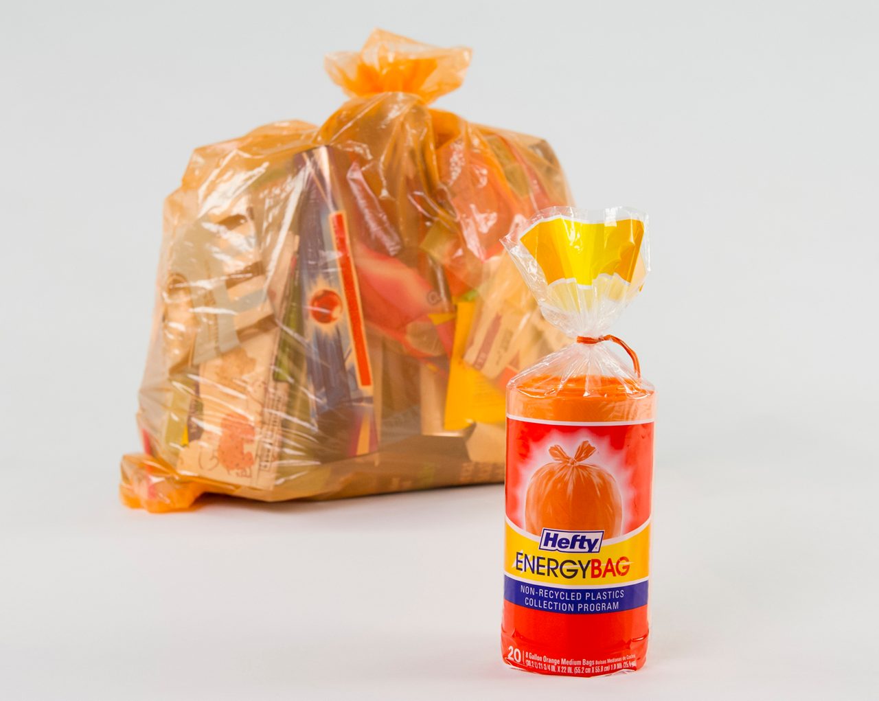 Product shot of Hefty Energy Bag with full bag behind it.