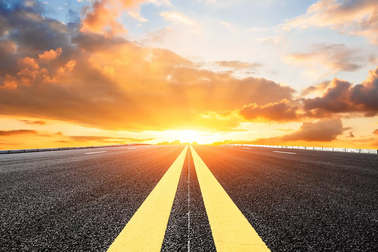 Asphalt road and sky cloud landscape at sunset