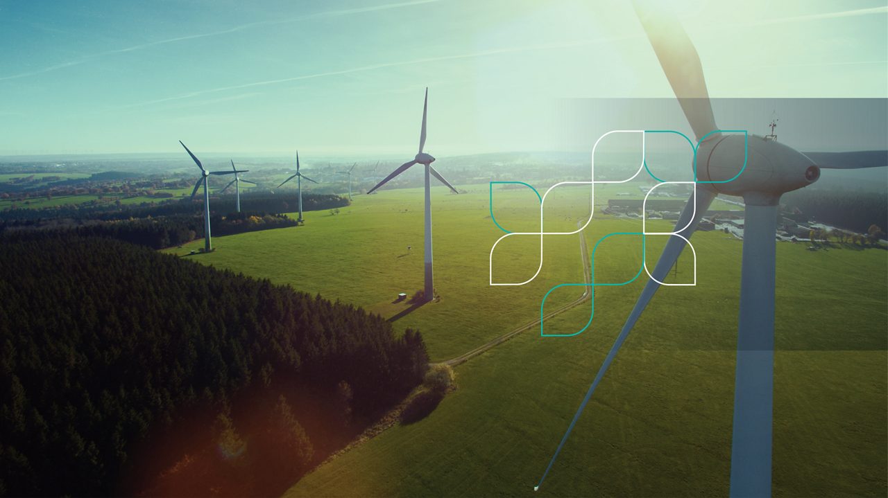 Arial view of wind farm integrating sustainability Science branding elements