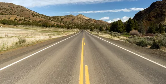 First-person view of Oregon Highway with High Desert Landscape  